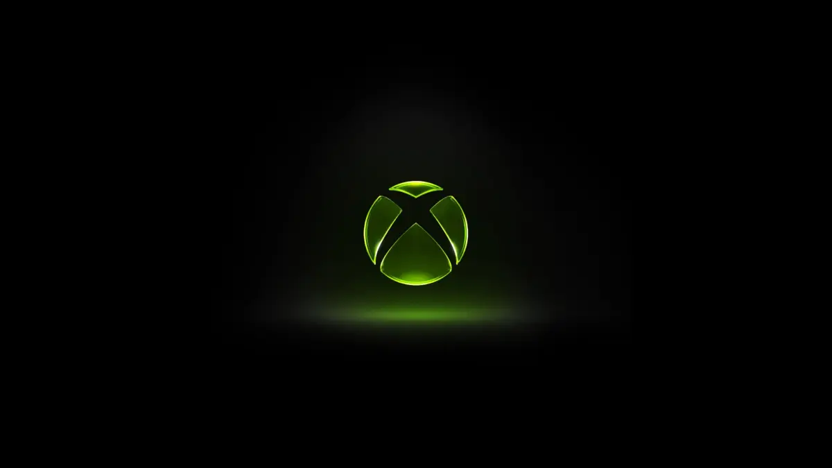 Logotipo esférico do Xbox com iluminação verde neon sobre fundo preto, representando a nova identidade visual revelada no rebranding de abril de 2026.